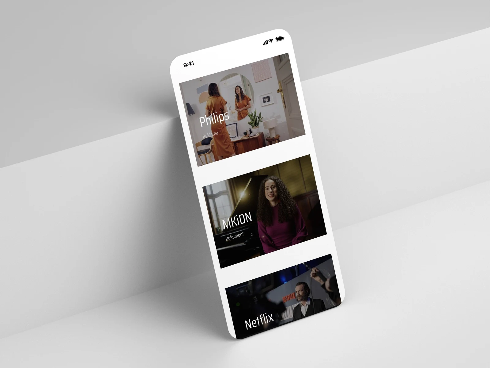 Kacper Sidło — i riquadri dei lavori nel portfolio su un iPhone
