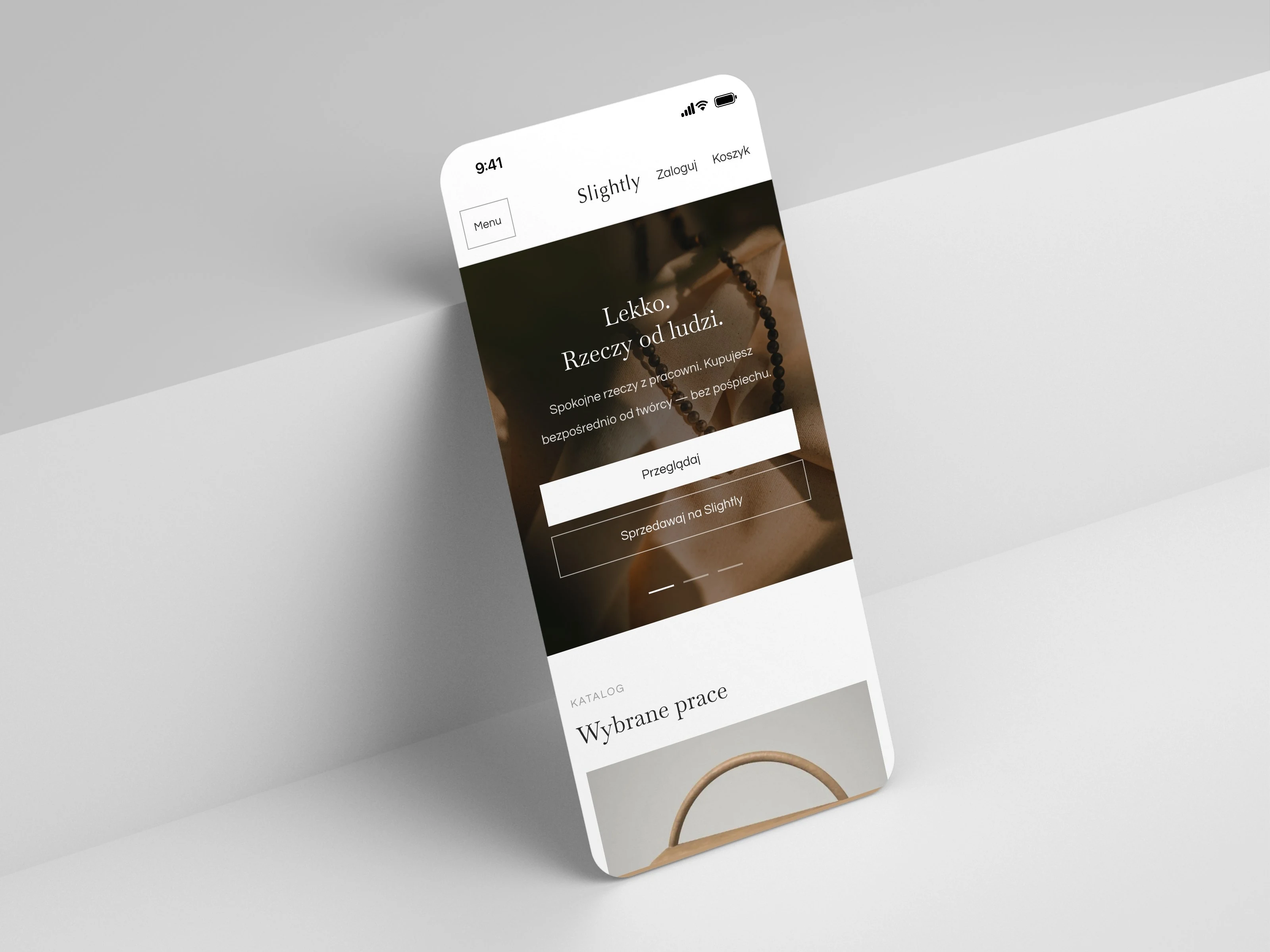 Slightly on an iPhone: the handmade shop home page with the line “Lekko. Rzeczy od ludzi.” and browse buttons