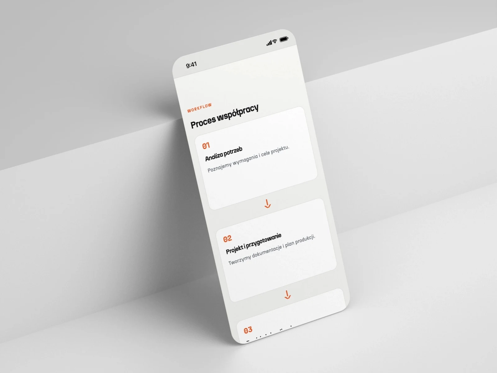 machinesmanufacturing.eu — projekt strony internetowej, mockup telefon scena schodek