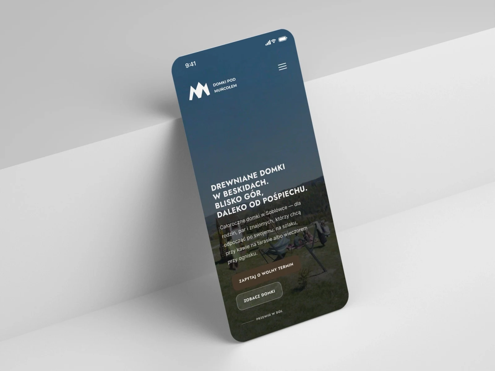domkipodmuncolem.pl — projekt strony internetowej, mockup telefon scena schodek